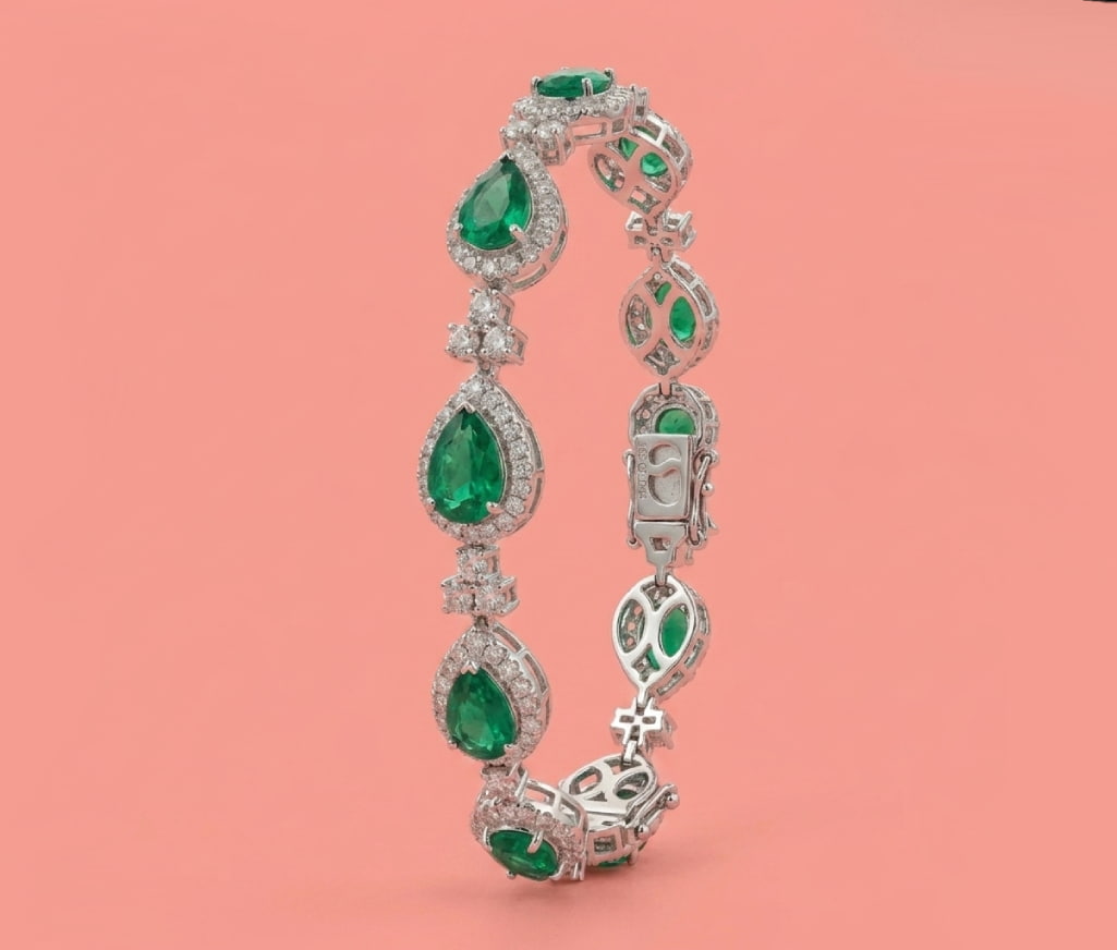 The Pear-Cut Emerald and Diamond Halo Bracelet – view 2 – Samuel & Co.